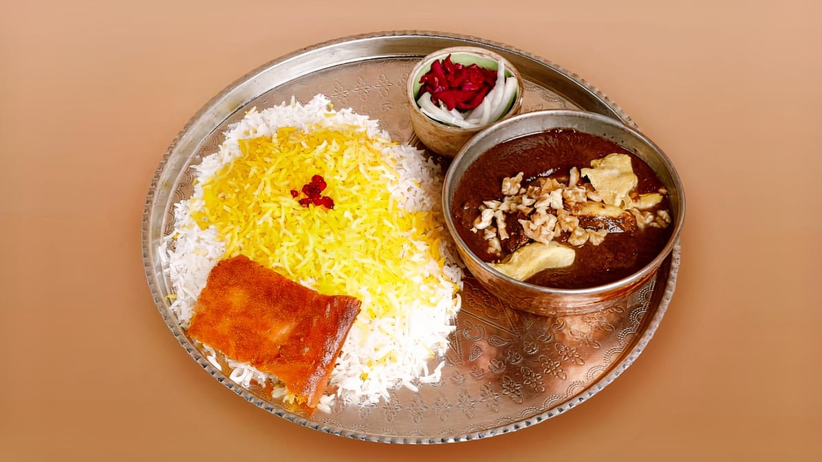 Fesenjoon with Rice(فسنجون ) (served with Soup or Pop)