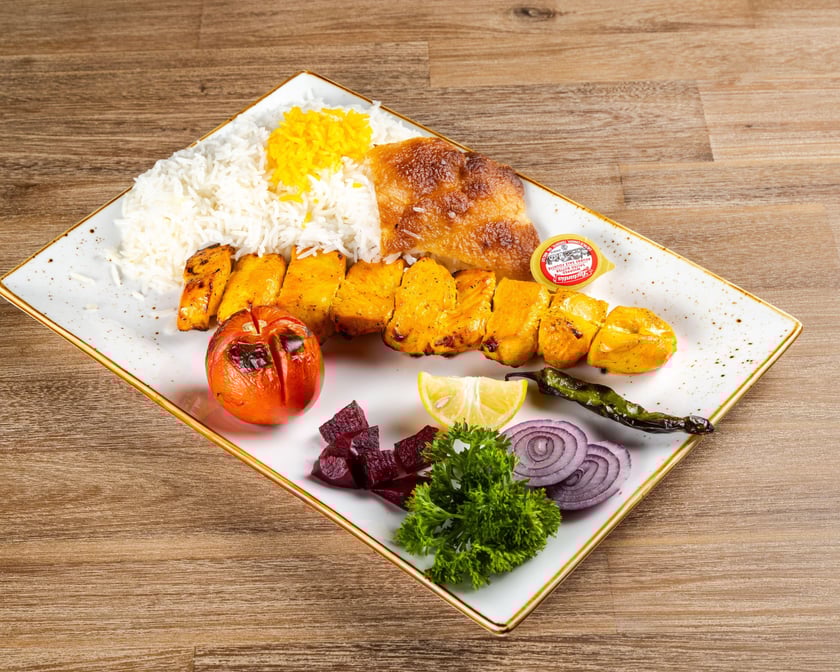 Signature Chicken Breast served with soup &pop/ چلو جوجه کباب سینه